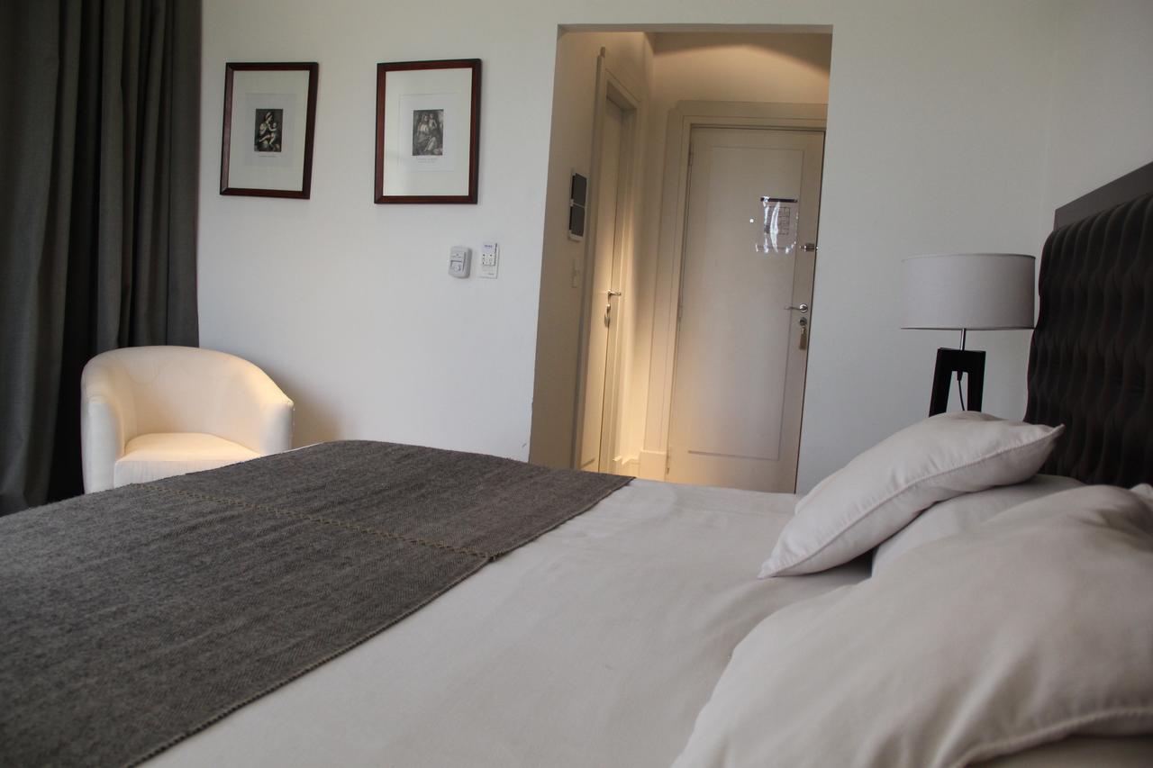Real Hotel Lujan Buitenkant foto