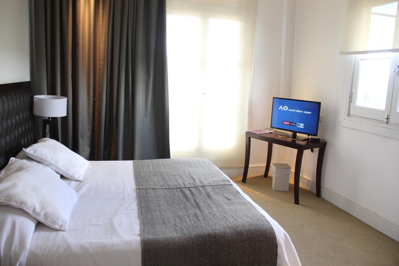 Real Hotel Lujan Buitenkant foto