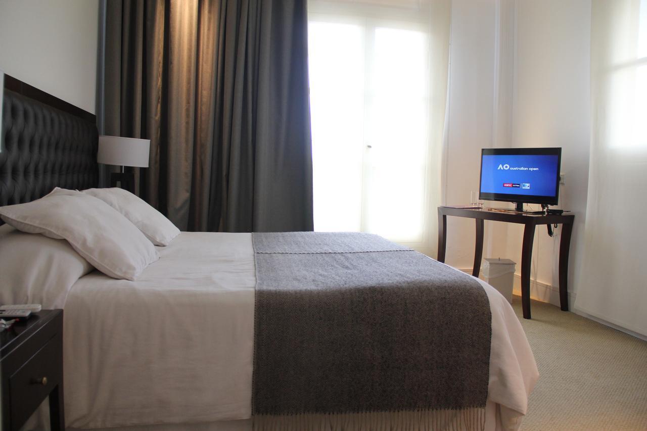 Real Hotel Lujan Buitenkant foto