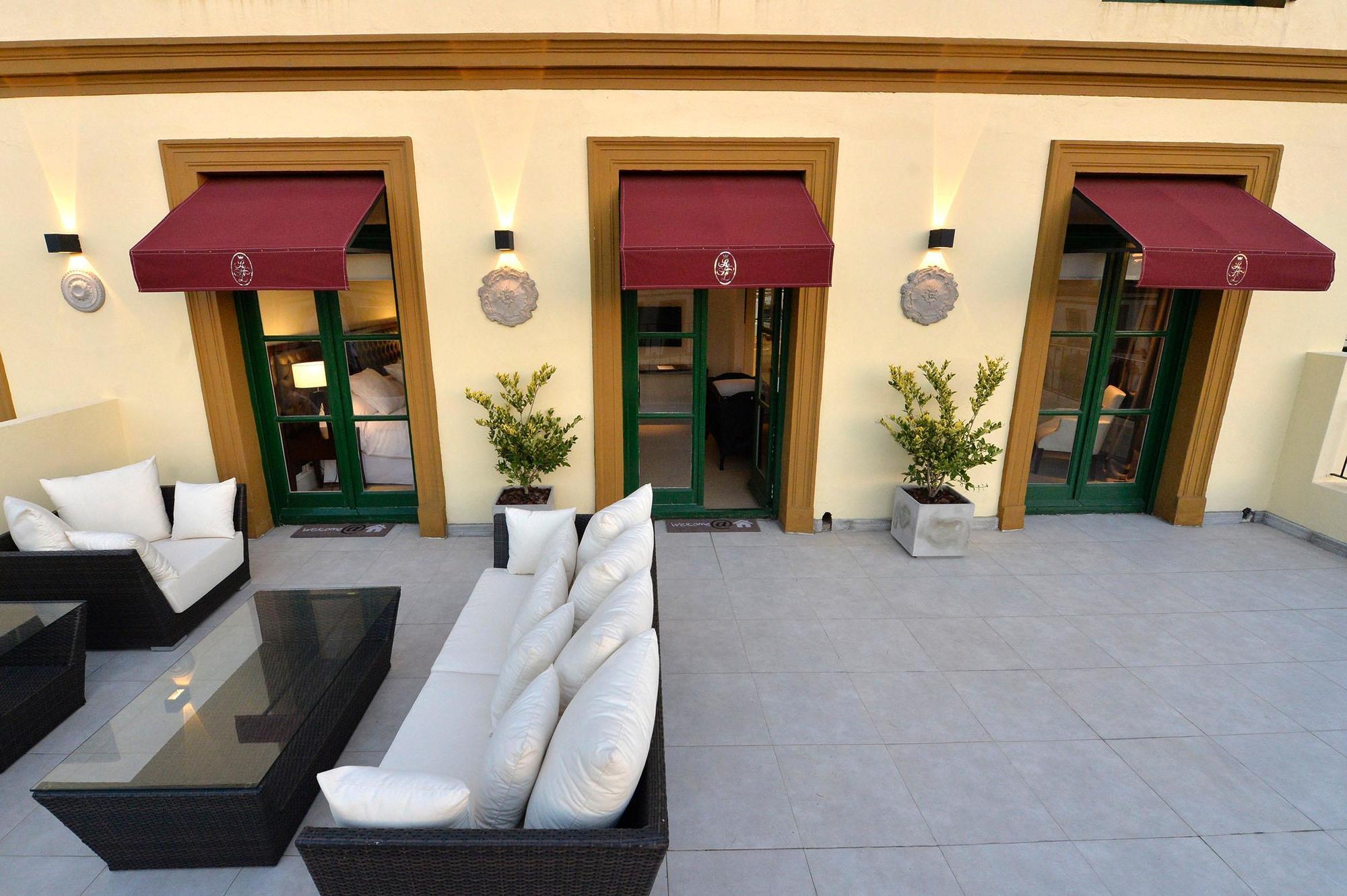 Real Hotel Lujan Buitenkant foto